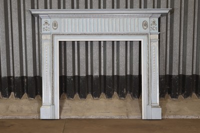 Lot 27 - A George III painted pine fire surround in the style of Robert Adam