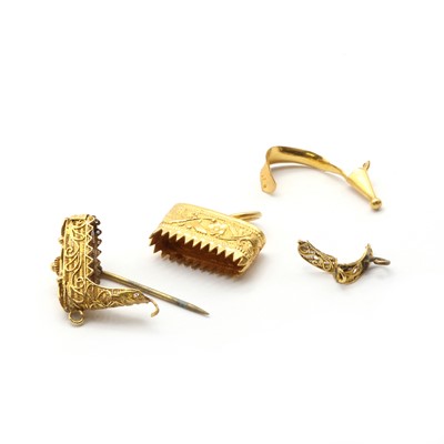 Lot 166 - Two gold tiger's claw pendants