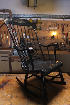 Lot 14 - An ebonised 'Boston Rocker' chair