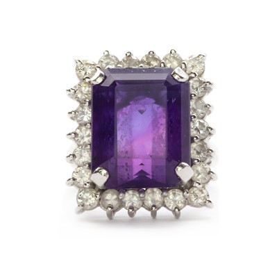 Lot 123 - A white gold amethyst and diamond cluster ring