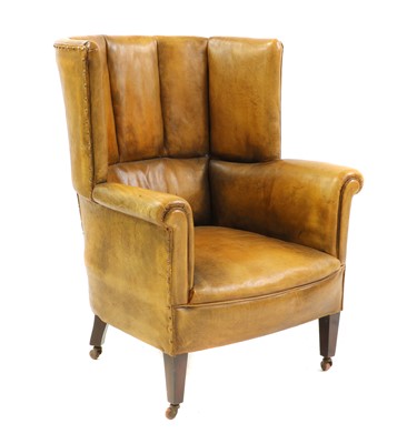 Lot 617 - A George III style barrel back armchair