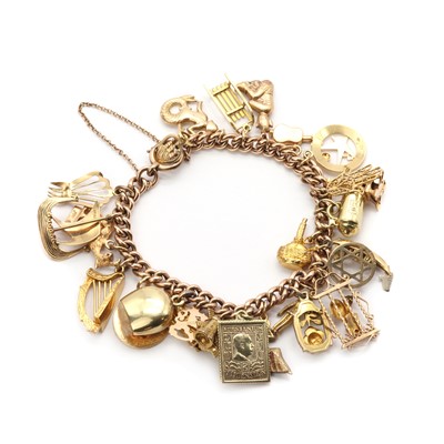 Lot 151 - A gold charm bracelet