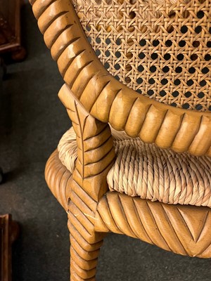 Lot 557 - A set of six blonde wood dining chairs