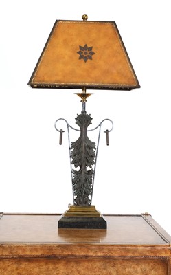 Lot 555 - A cast metal and marble table lamp