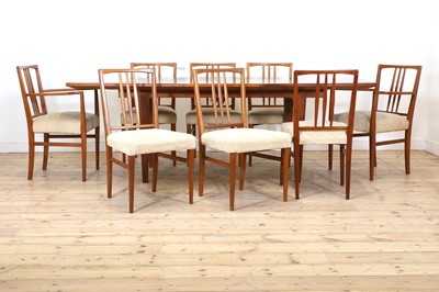 Lot 250 - A Gordon Russell teak and walnut dining table and eight chairs