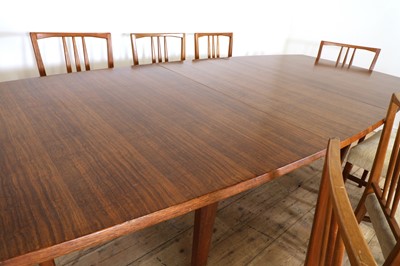 Lot 250 - A Gordon Russell teak and walnut dining table and eight chairs