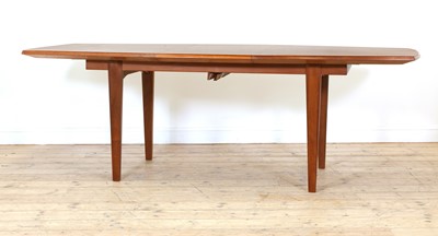 Lot 250 - A Gordon Russell teak and walnut dining table and eight chairs