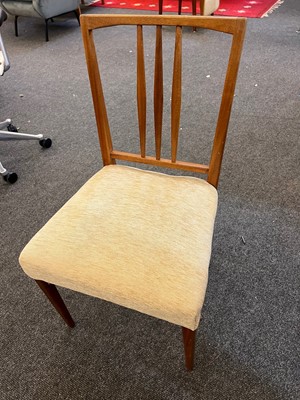 Lot 250 - A Gordon Russell teak and walnut dining table and eight chairs