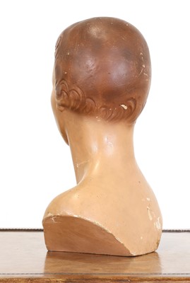 Lot 170 - A composition and painted advertising bust