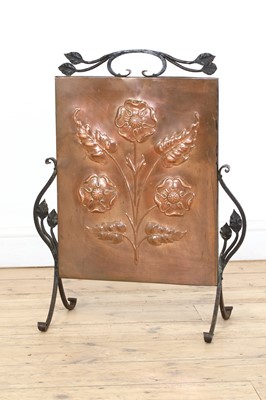 Lot 57 - An Arts and Crafts copper embossed fire screen