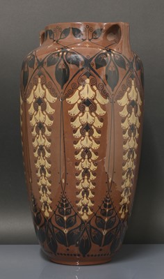Lot 78 - A glazed earthenware two-handled vase