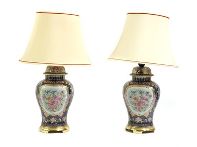 Lot 387 - A pair of large Chinese style porcelain vase lamps