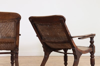 Lot 305 - A near pair of teak planters' chairs