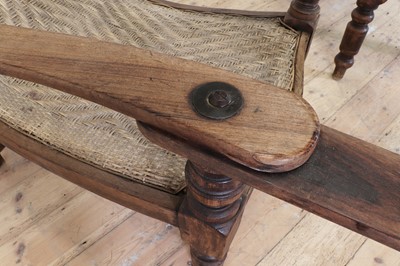 Lot 305 - A near pair of teak planters' chairs