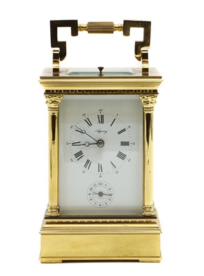 Lot 459 - A brass carriage clock