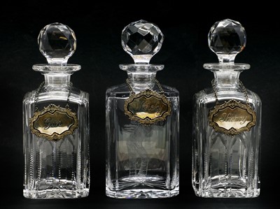 Lot 407 - A group of three cut glass decanters