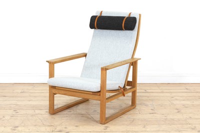 Lot 426 - A Danish 'Model 2254' oak sled lounge chair