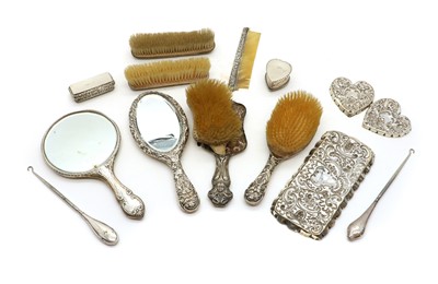 Lot 50 - A collection of silver mounted dressing table items