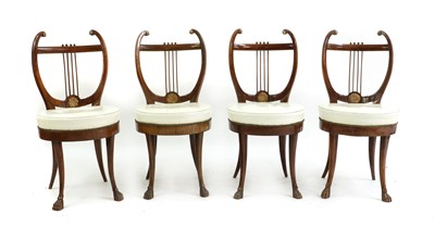Lot 600 - A set of four Austrian Neoclassical cherrywood chairs