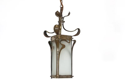 Lot 30 - An Arts and Crafts brass hanging lantern