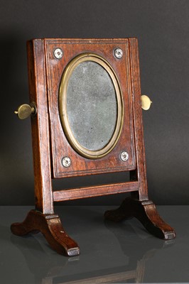 Lot 317 - A Victorian brass-mounted oak shaving mirror