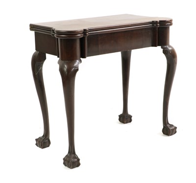 Lot 595 - An early George III mahogany tea table