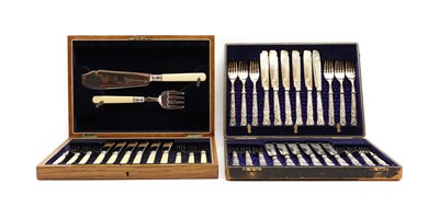 Lot 79 - A cased set of twelve silver handled fish knives and forks