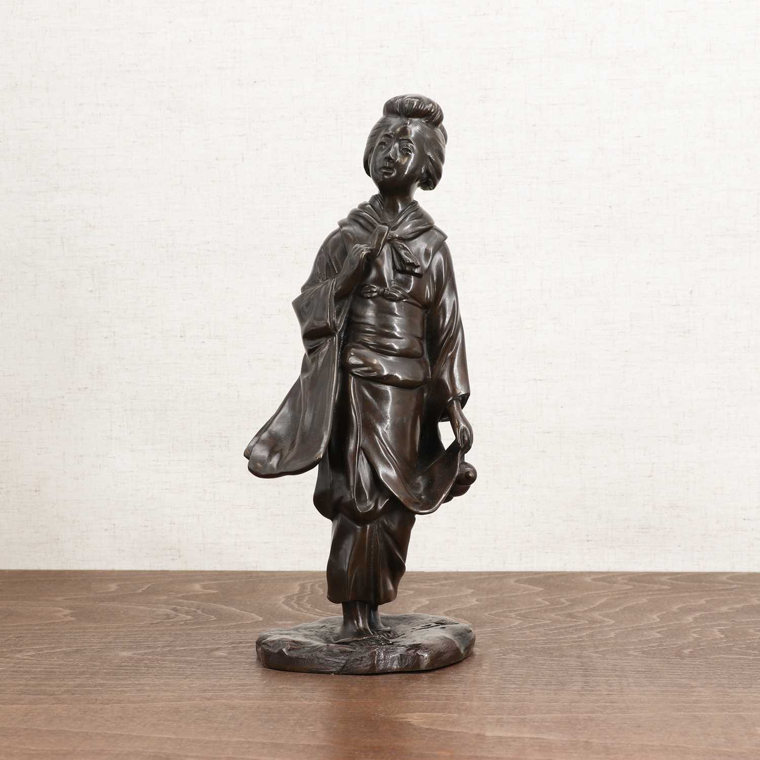 Lot 271 - A Japanese bronze okimono