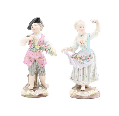 Lot 369 - A pair of Meissen porcelain figures