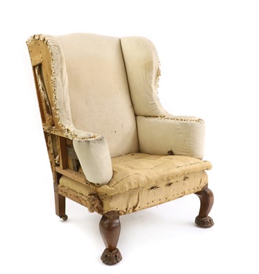 Lot 483 - A walnut wing armchair