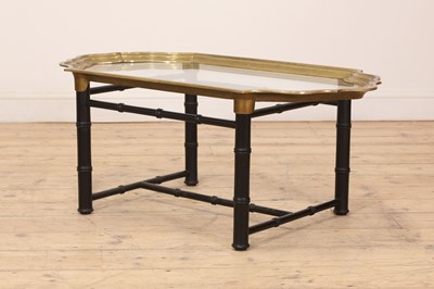 Lot 552 - A brass and painted coffee table