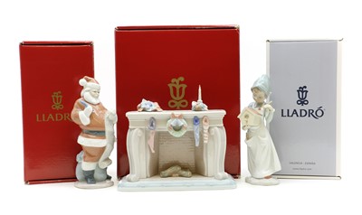 Lot 389 - A group of three Lladro porcelain figures