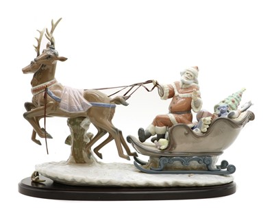 Lot 391 - A Lladro porcelain 'Up and Away' figure group
