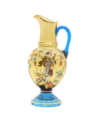 Lot 426 - An amber and blue glass claret jug