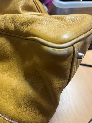 Lot 316 - A Prada Vitello Daino tan leather buckle tote