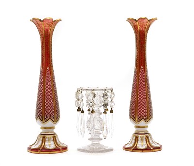 Lot 425 - A pair of Bohemian ruby and opal cased glass vases