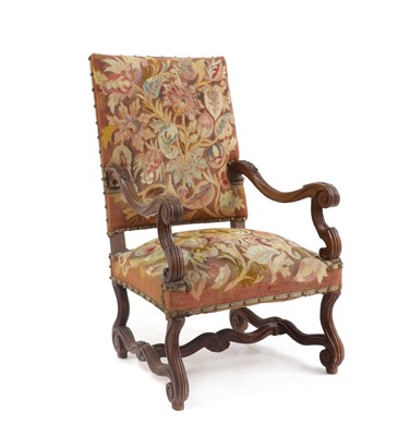 Lot 410 - A carved walnut armchair