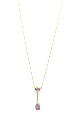 Lot 124 - A gold amethyst Edna May style pendant