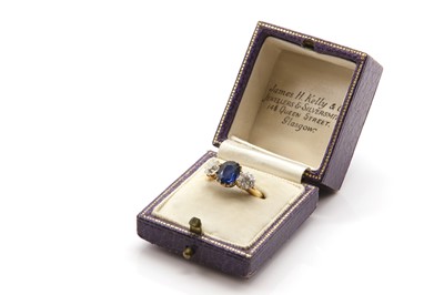 Lot 89 - A gold sapphire and diamond three stone ring, c.1900