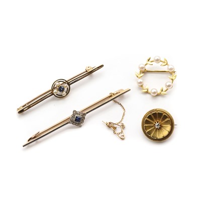 Lot 153 - Four gold brooches