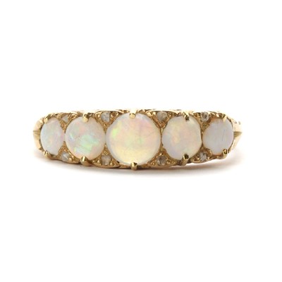 Lot 8 - A Victorian gold five stone opal and diamond ring