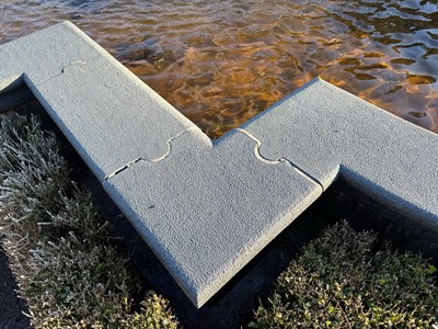 Lot 687 - A granite garden water feature surround