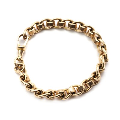 Lot 100 - A gold curb and roller link bracelet