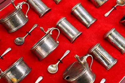 Lot 120 - An eighteen-piece cased silver cruet set