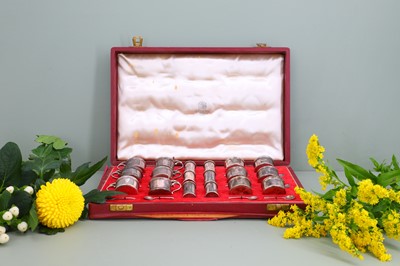 Lot 120 - An eighteen-piece cased silver cruet set