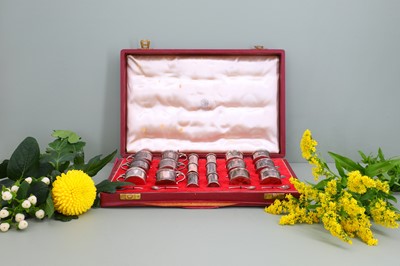 Lot 120 - An eighteen-piece cased silver cruet set