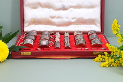 Lot 120 - An eighteen-piece cased silver cruet set