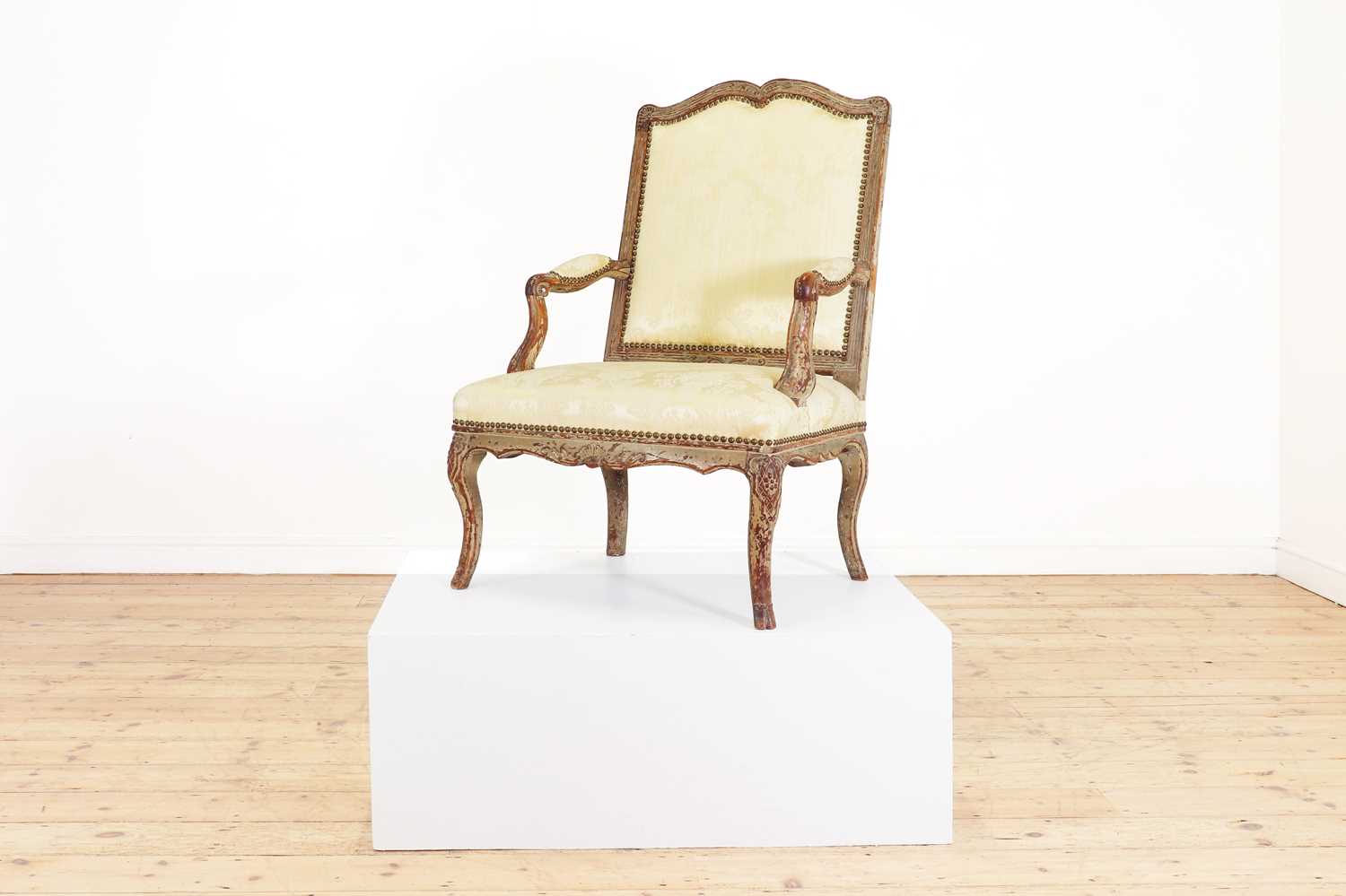 Lot 53 - A Régence painted walnut fauteuil