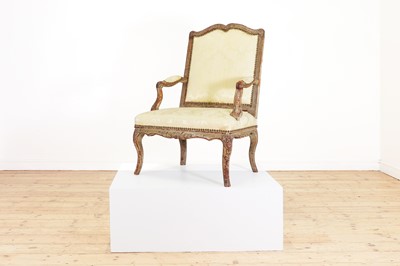 Lot 53 - A Régence painted walnut fauteuil
