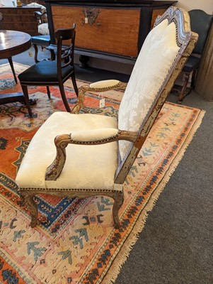 Lot 53 - A Régence painted walnut fauteuil
